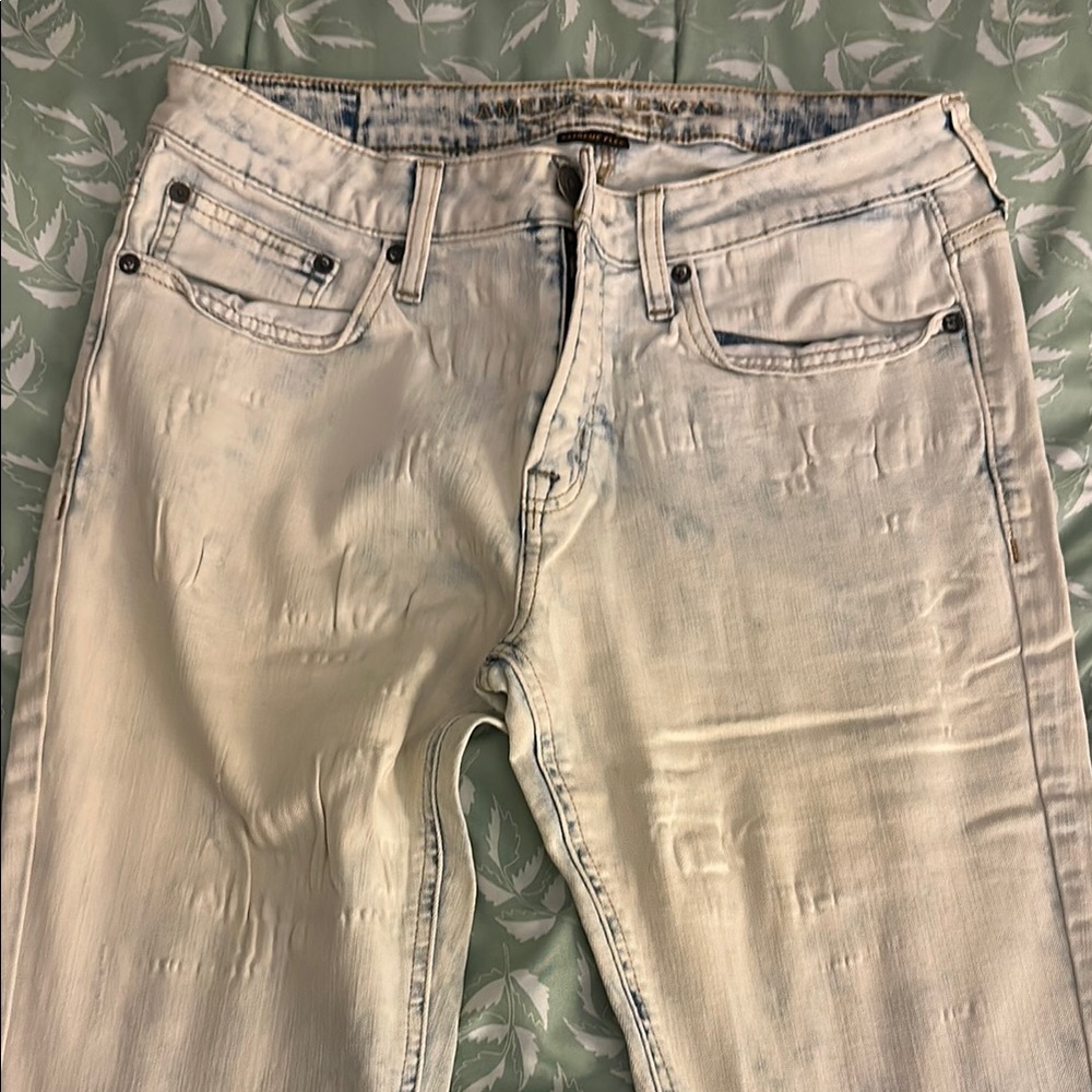 White Skinny Jeans with Distressed Details